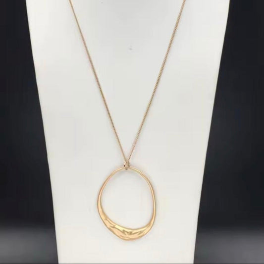 Lovely Long Gold Oval Pendant
